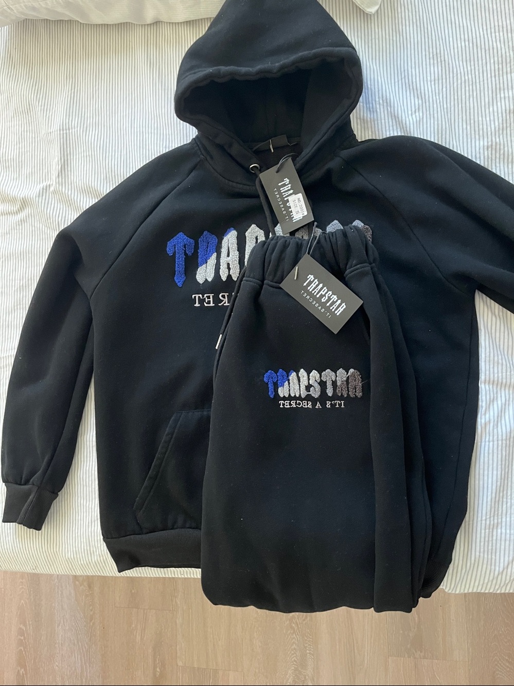 TRAPSTAR Black Hoodie with Multicolor Embroidered Text
